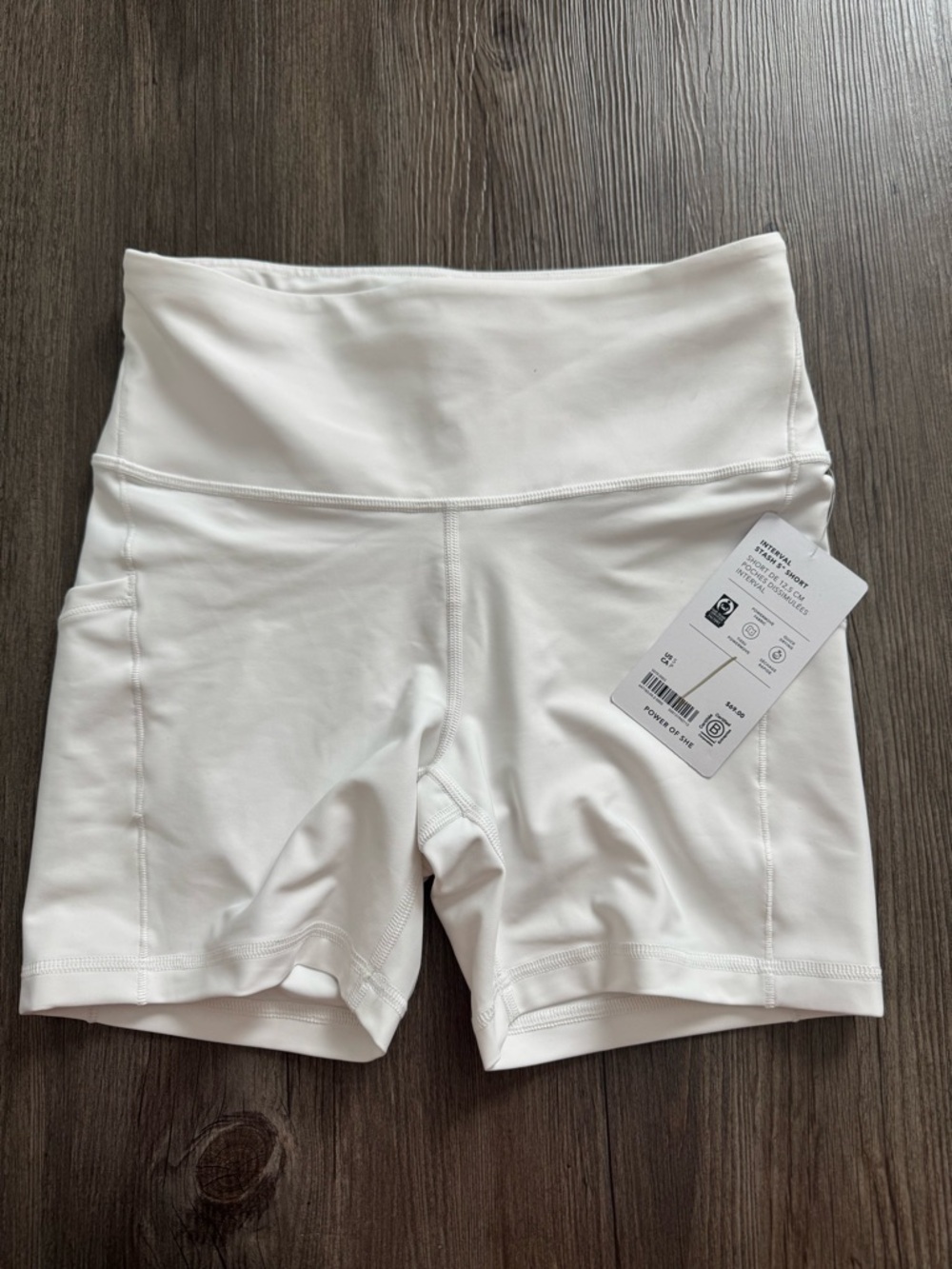 Athleta interval stash 5’ biker shorts White High-Rise Performance Bike Shorts